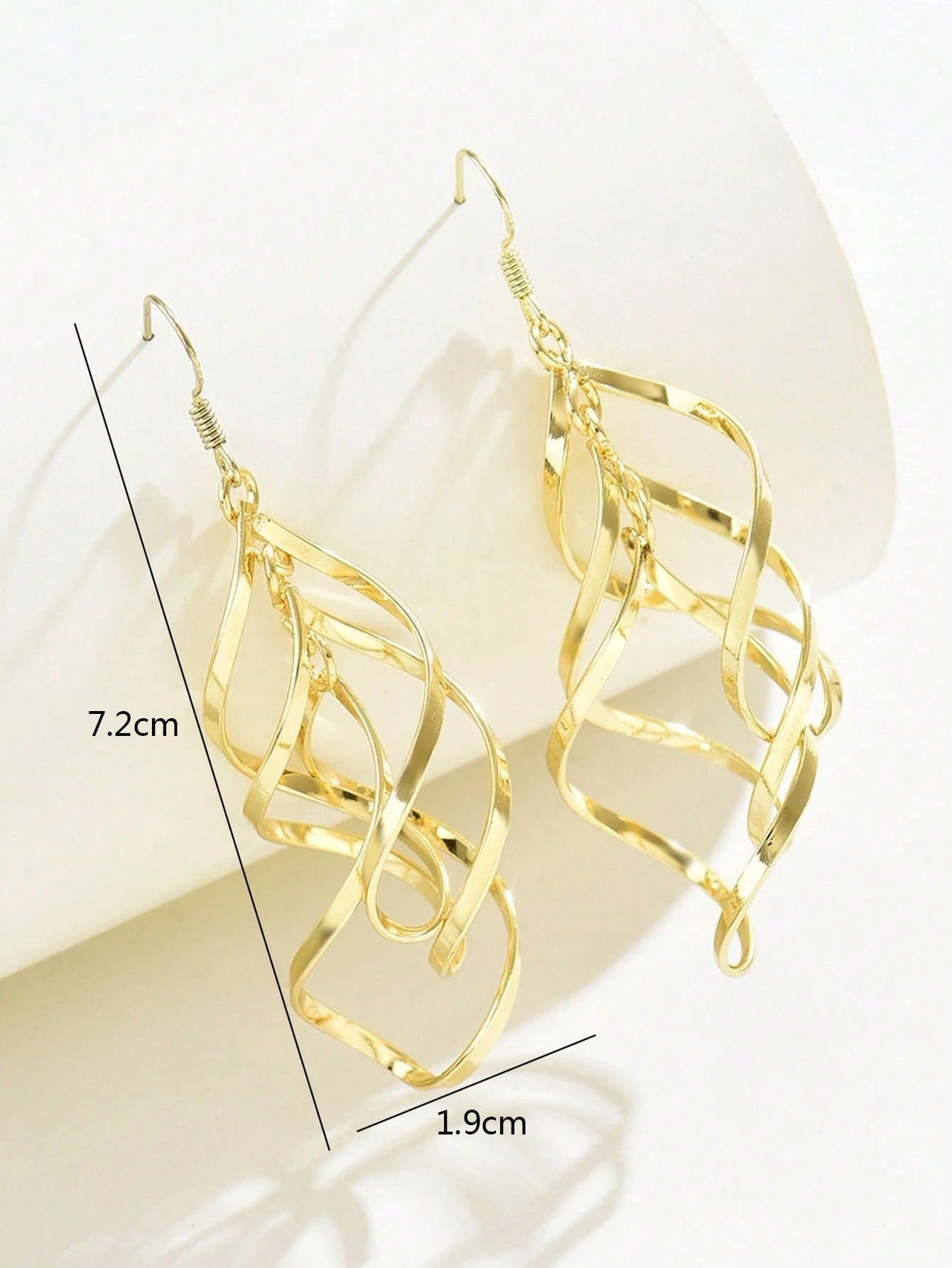 GOLD TONED GEOMETRIC SPIRAL CURVED WAVE EARRINGS