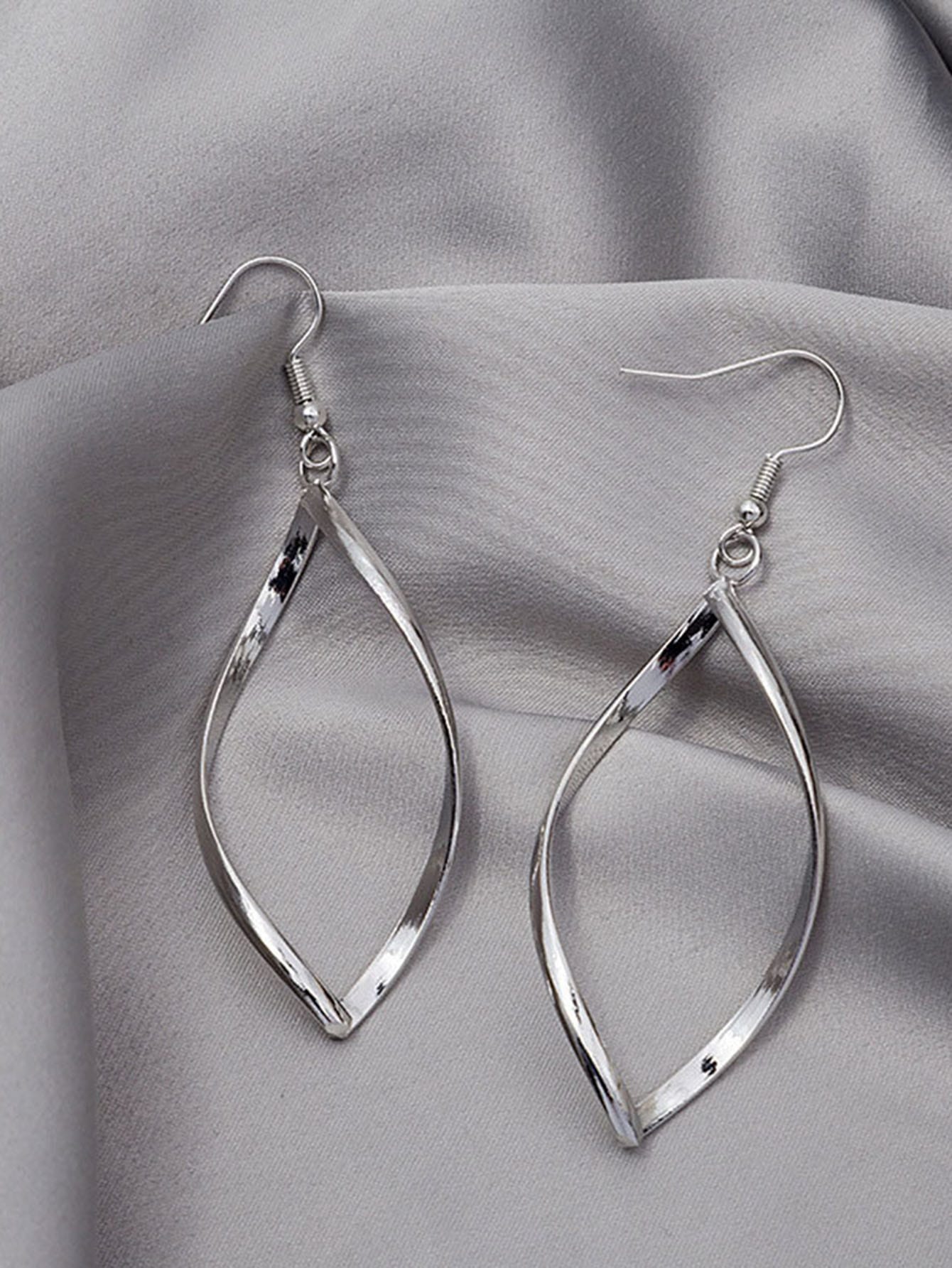 SILVER TONED SPIRAL AND WAVY AND CURVY EARRINGS