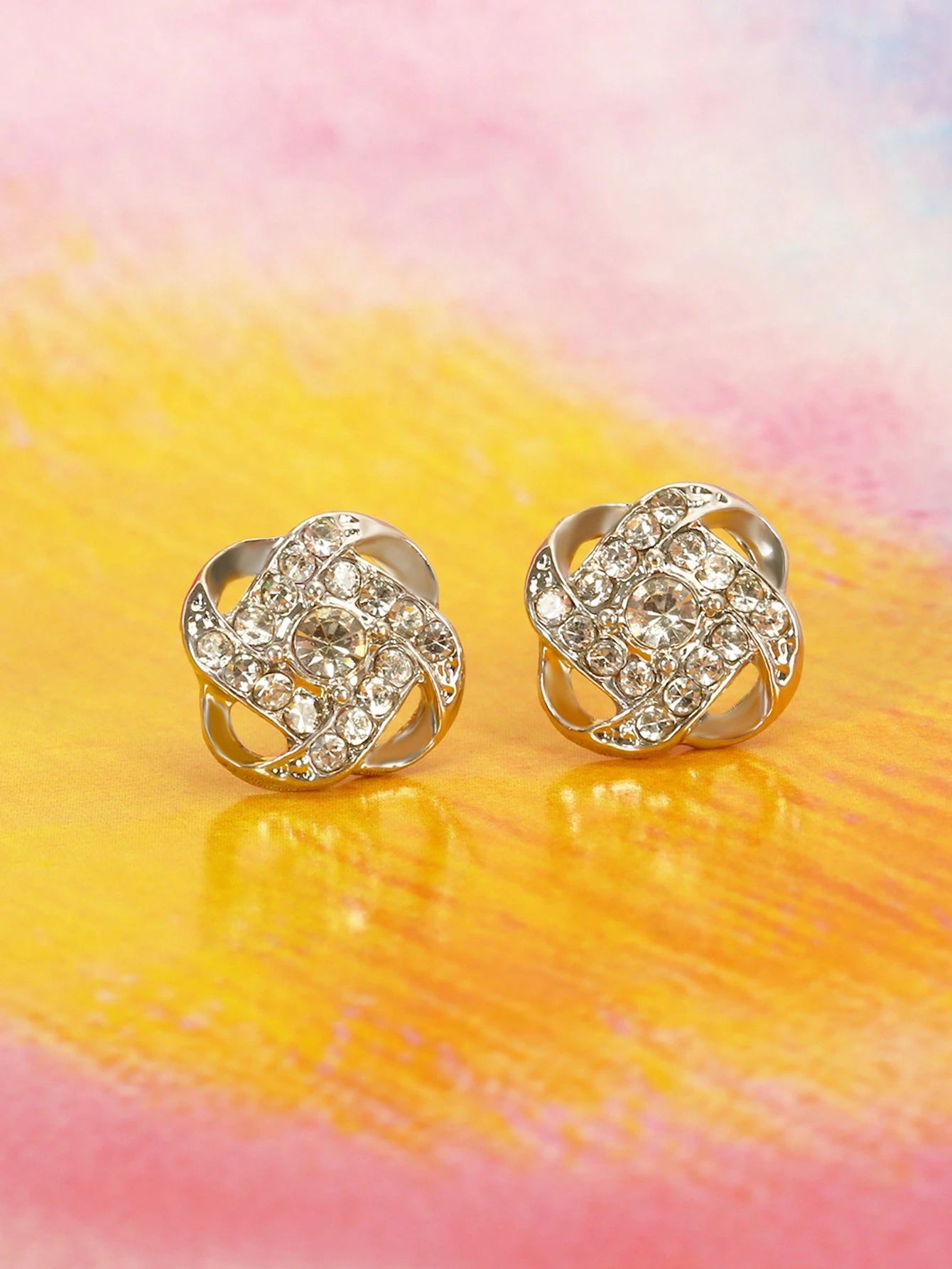 SILVER TONED STUD EARRINGS