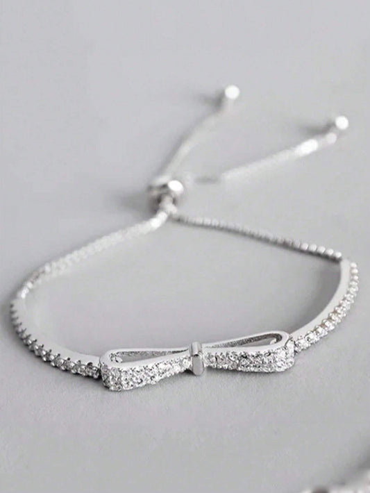 SILVER TONED BOW BRACELET