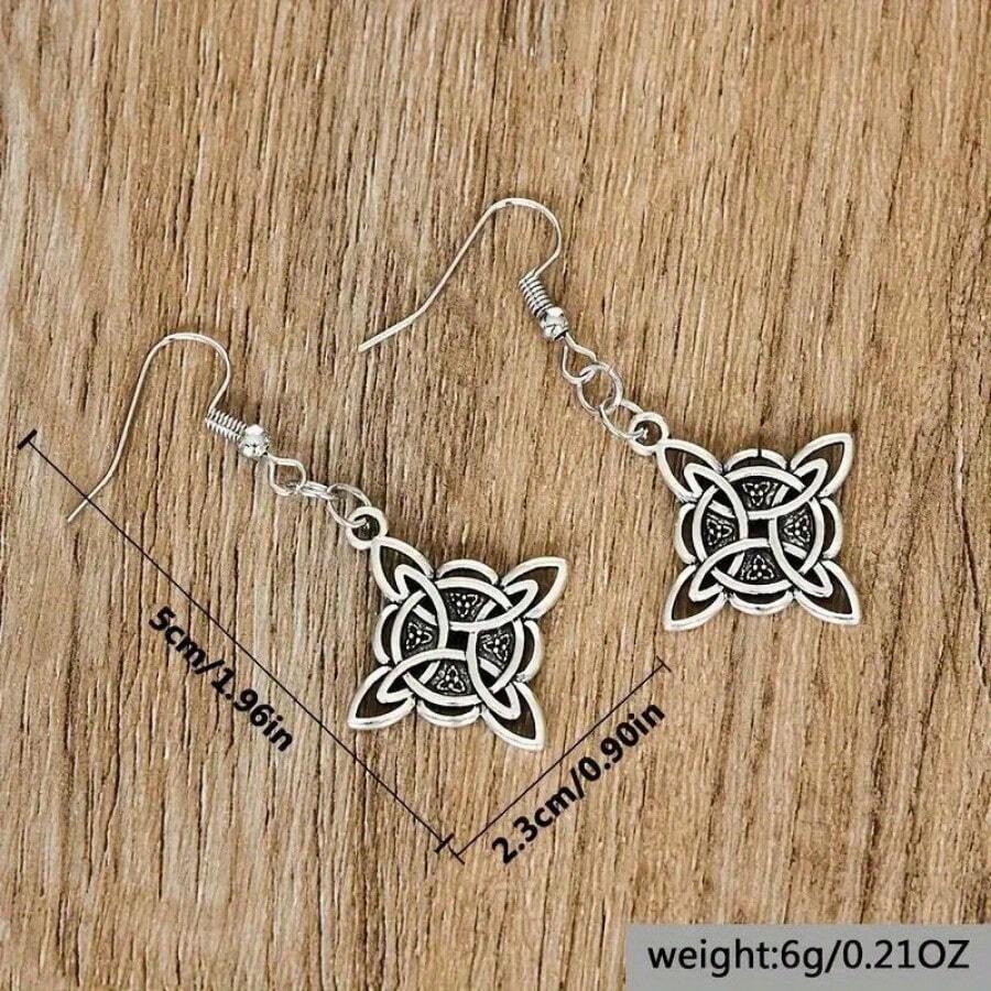 SILVER TONED WITCH KNOT EARRINGS