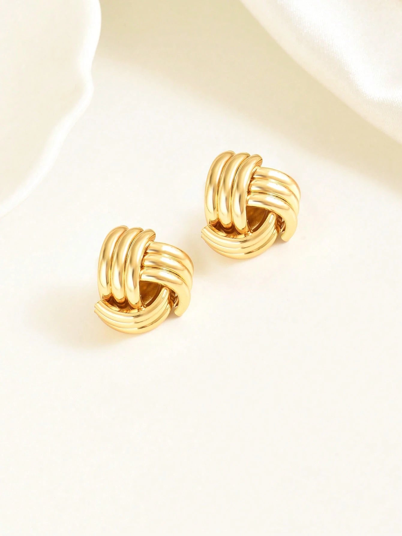 GOLD TONED KNOT EARRINGS