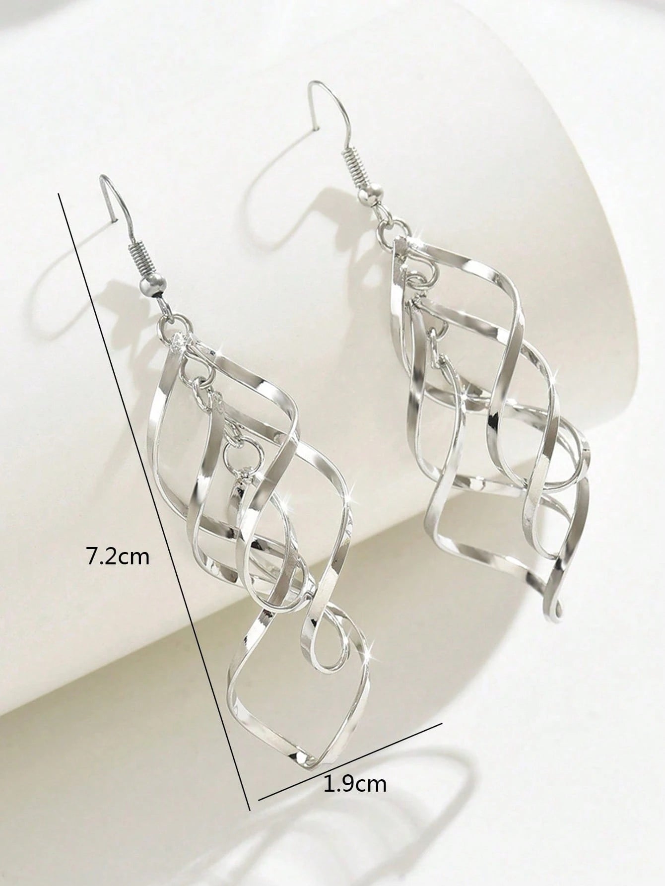 SILVER TONED GEOMETRIC SPIRAL CURVED WAVE EARRINGS