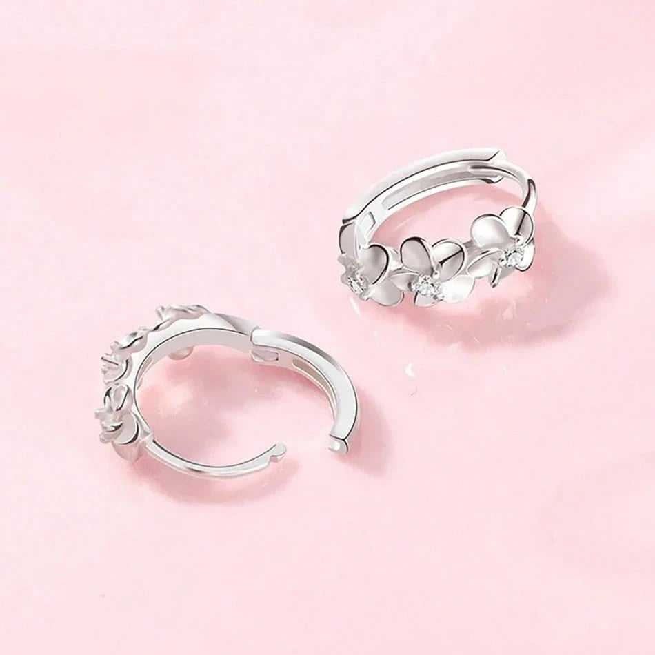 SILVER TONED FLOWER HOOP EARRINGS
