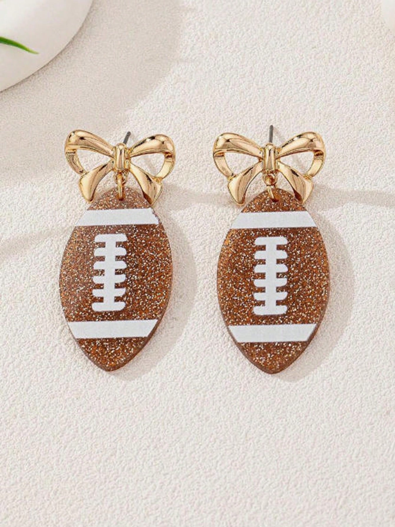 BOWKNOT & FOOTBALL PENDANT EARRINGS