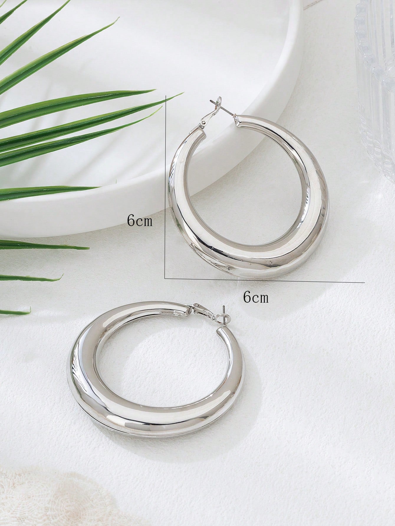 SILVER TONED HOLLOW HOOPS