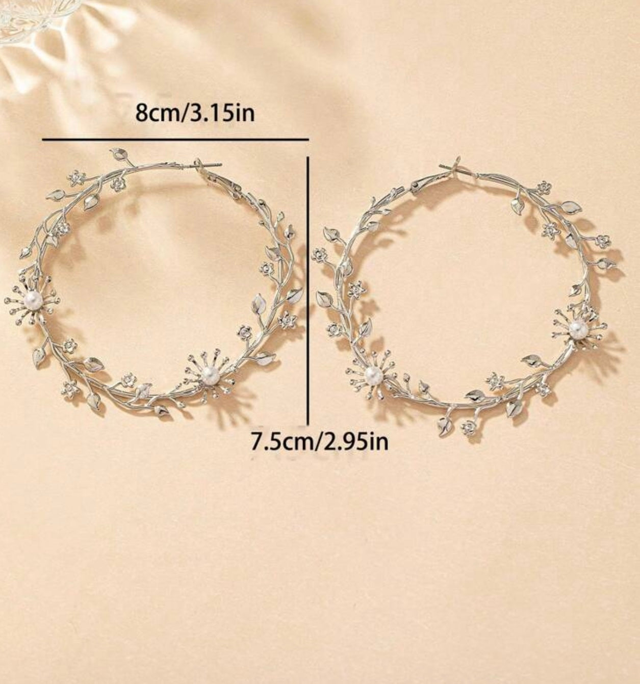 SILVER TONED FLOWER HOOP EARRINGS