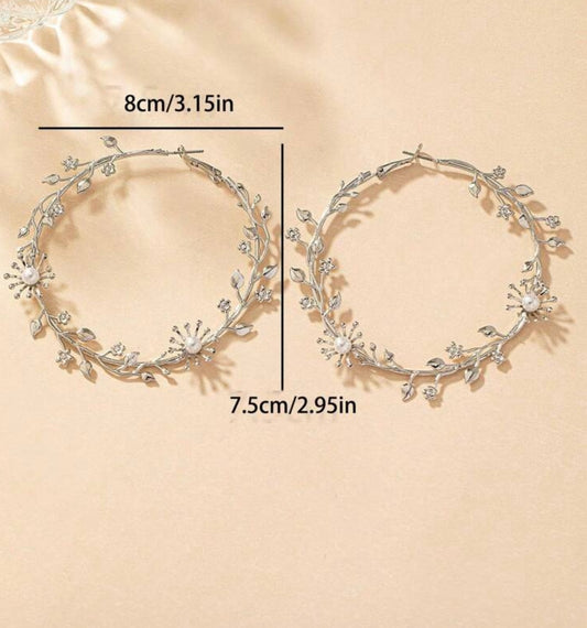 SILVER TONED FLOWER HOOP EARRINGS
