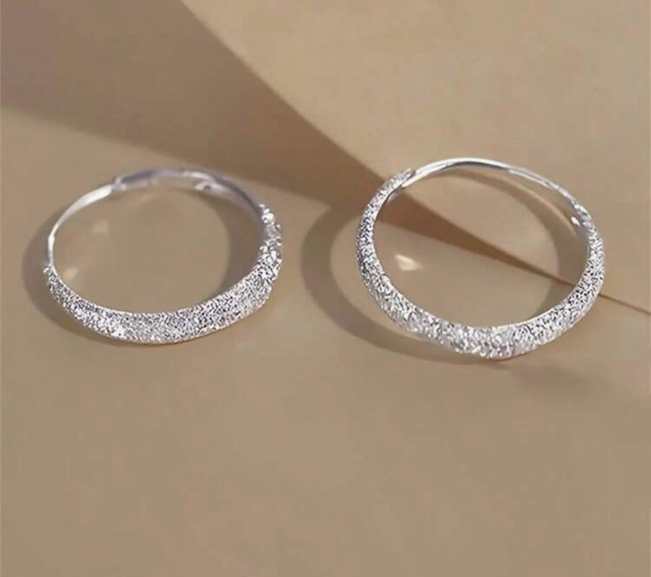 SMALL SILVER TONED HOOP EARRINGS