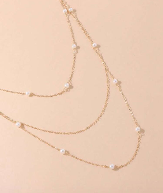 GOLD TONED AND PEARL NECKLACE